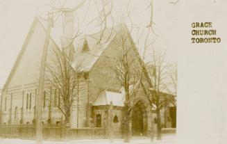 Black and white photograph of gothic style church..