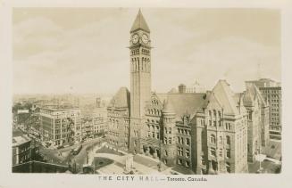 Black and white photograph of a large Richardsonian Romanesque building with a central clock to…