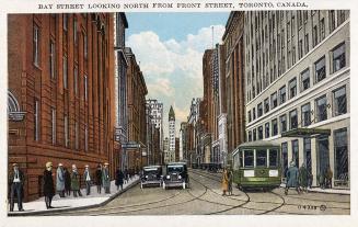 Colorized picture of a busy city street with multi-story building on either side of it; automob…