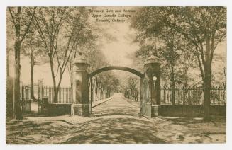 Sepia-toned postcard depicting the entrance gate at Upper Canada College in Toronto. Caption st…