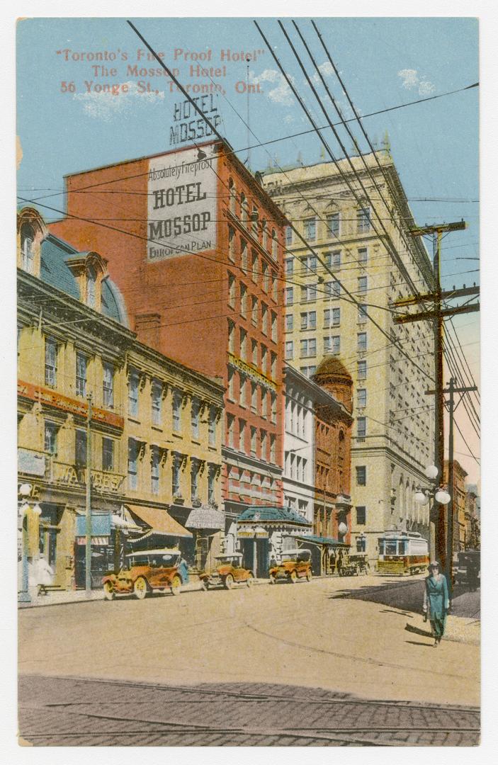 Sepia toned photograph a busy downtown street with skyscrapers.