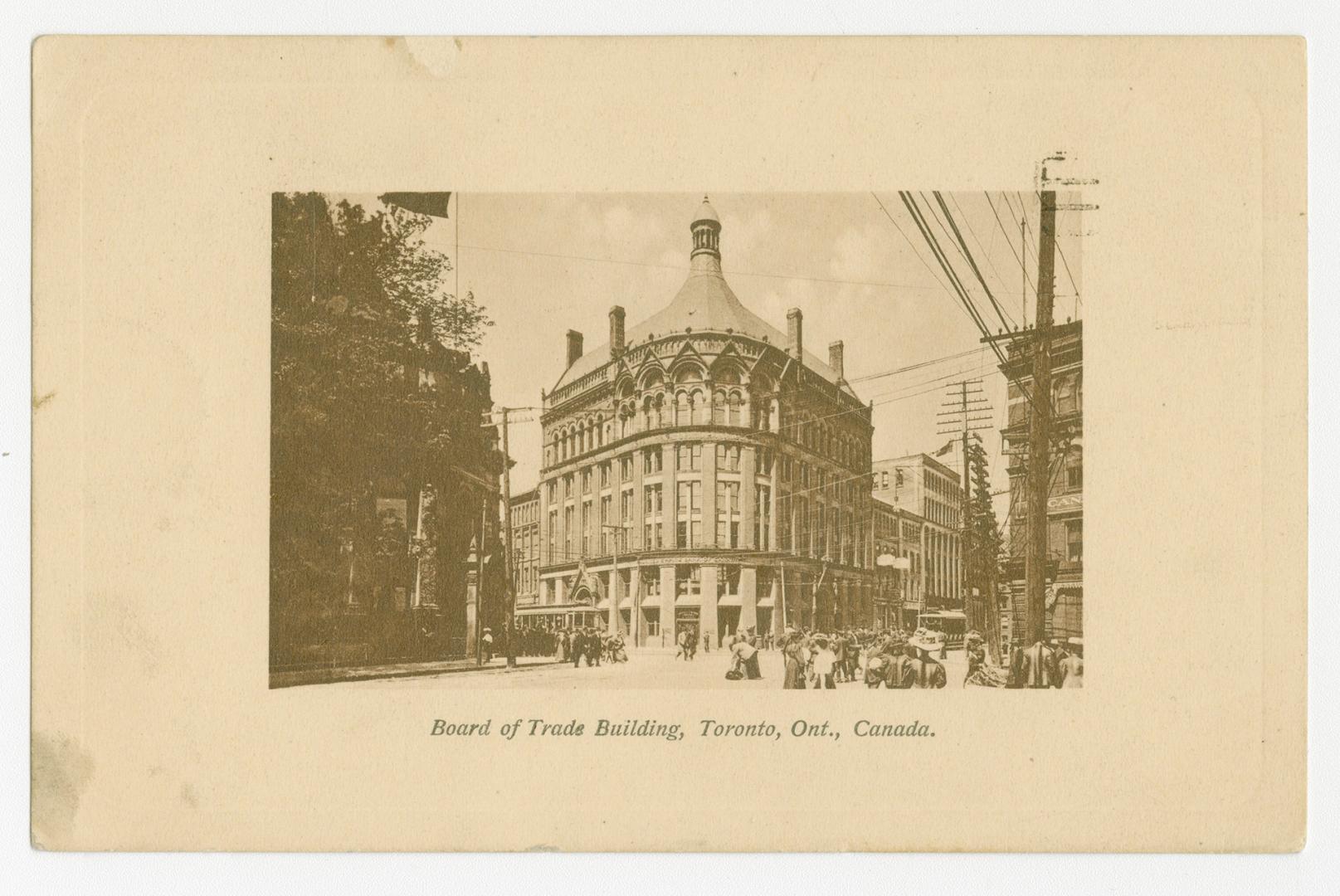 Sepia toned photograph of an early skyscraper with a curved roof set in a white frame.