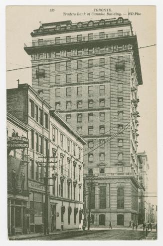 Black and white photograph of an early skyscraper.