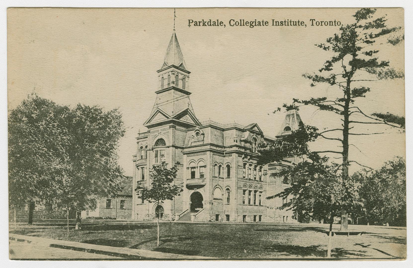 Black and white of a large, building with two towers built in a Romanesque style.