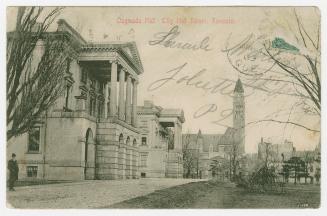 Picture of law buildings and tower of city hall. 