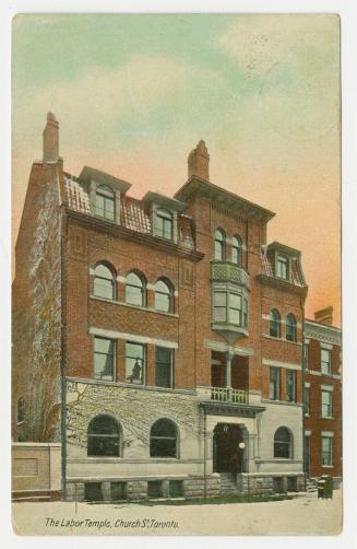 Picture of large brick and stone building. 