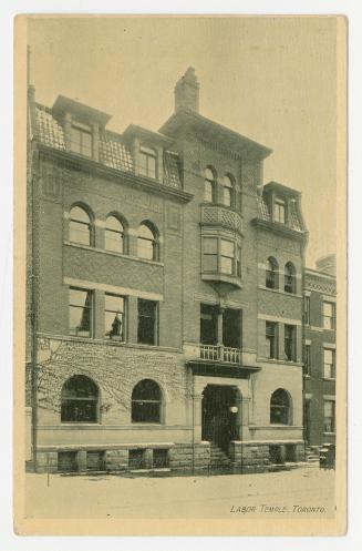 Picture of large brick and stone building.