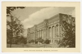 Black and white photograph of a large stone building in the Italianate style.