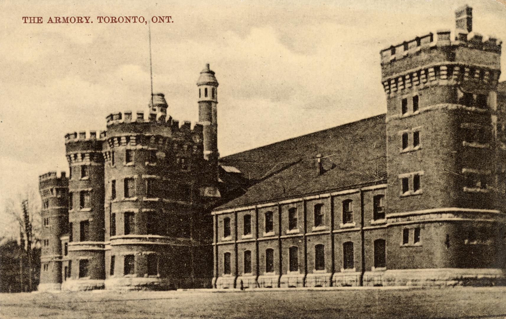 Black and white photograph of a very large Romanesque Revival, castle-like structure. 