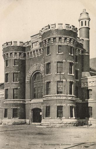 Black and white photograph of a very large Romanesque Revival, castle-like structure. 