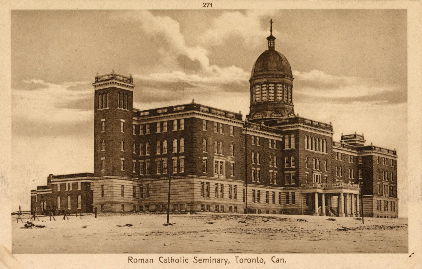 Sepia-toned postcard depicting a photo of the exterior of St. Augustine's seminary, with captio…