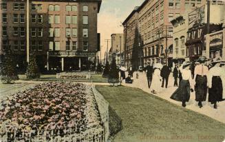 Colour postcard depicting a photo of the exterior of the garden and sidewalk in front of City H…