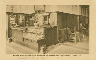 Sepia toned photograph of the interior/lobby of a restaurant.