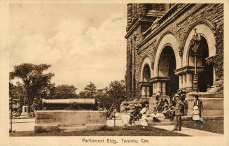 Picture of three entrance to the parliament buildings with people sitting and standing on the f…