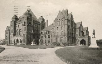 Picture of the Parliament buildings and front lawn and driveway. 