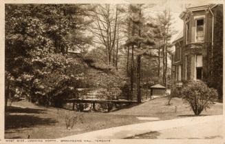 Sepia toned photograph of a very large Victorian building complex and grounds.