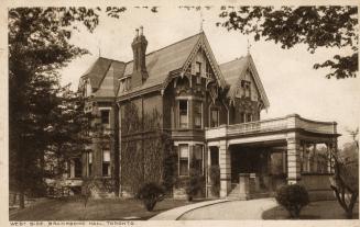 Sepia toned photograph of a very large Victorian building complex and grounds.