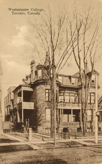 Sepia toned photograph of a very large Victorian building complex.