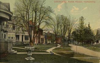 Colour postcard depicting a residential neighbourhood, with several homes, front lawns, and wal…