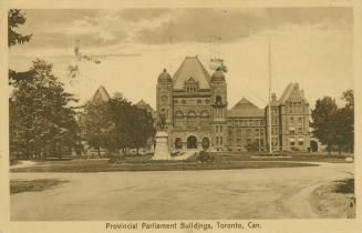 Black and white photograph a large government building.