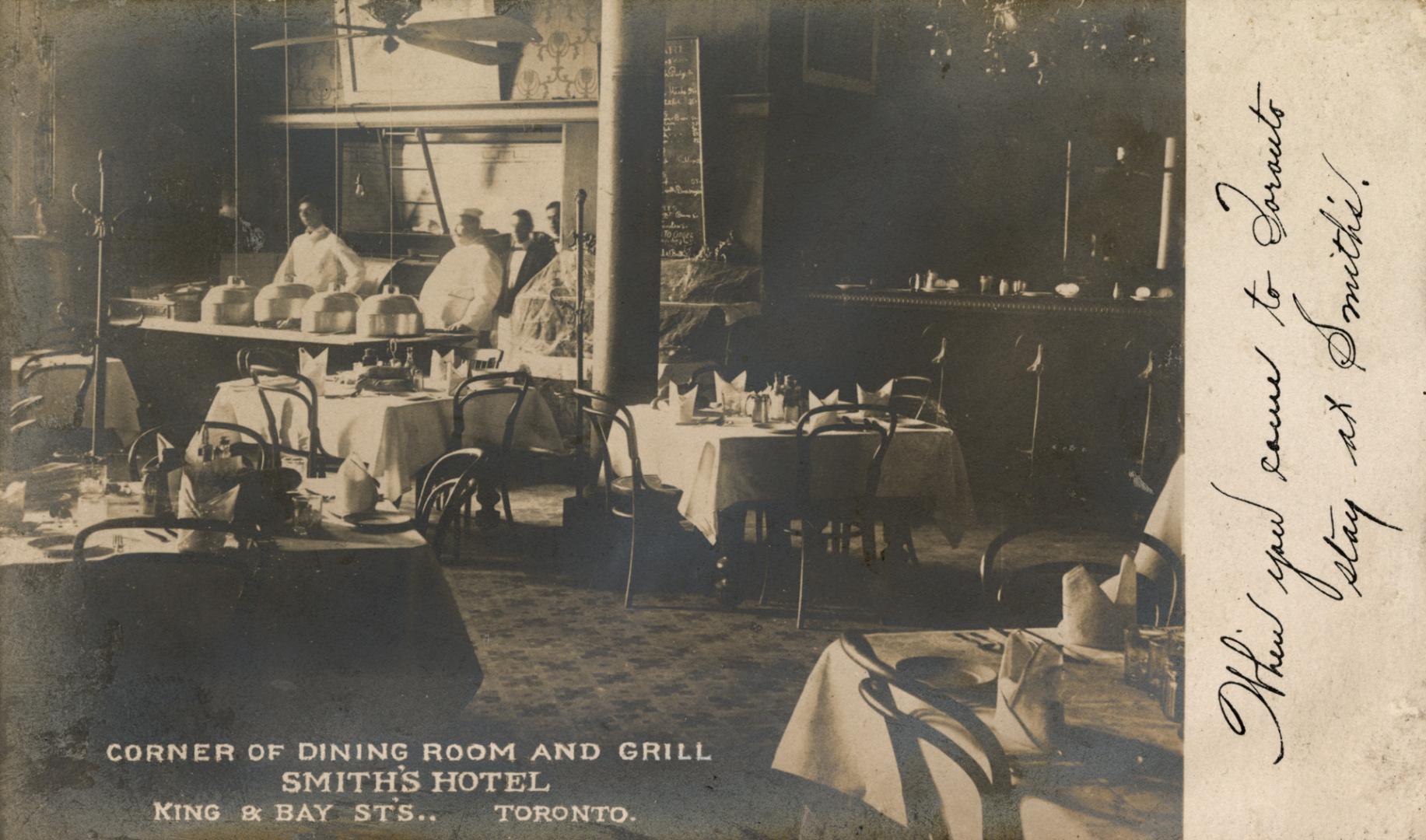 Faded grey-toned postcard depicting an image of the inside of a dining room at Smith's Hotel wi…