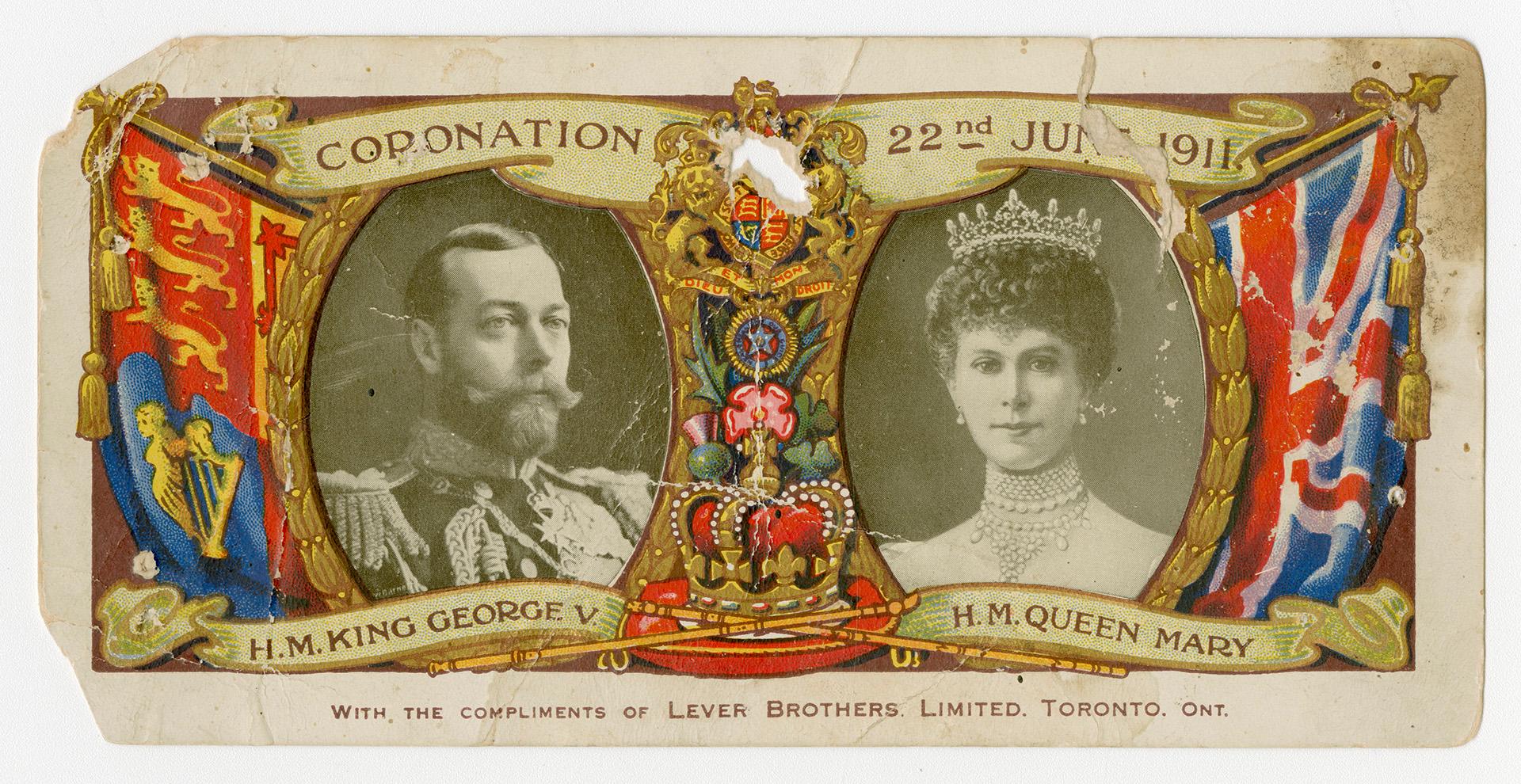 Photo portraits of King George V, and Queen Mary. The Union Jack flag and Royal Standard (outsi…