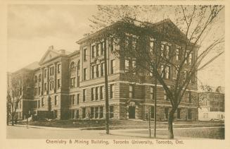 Sepia toned photograph of a four story collegiate building.