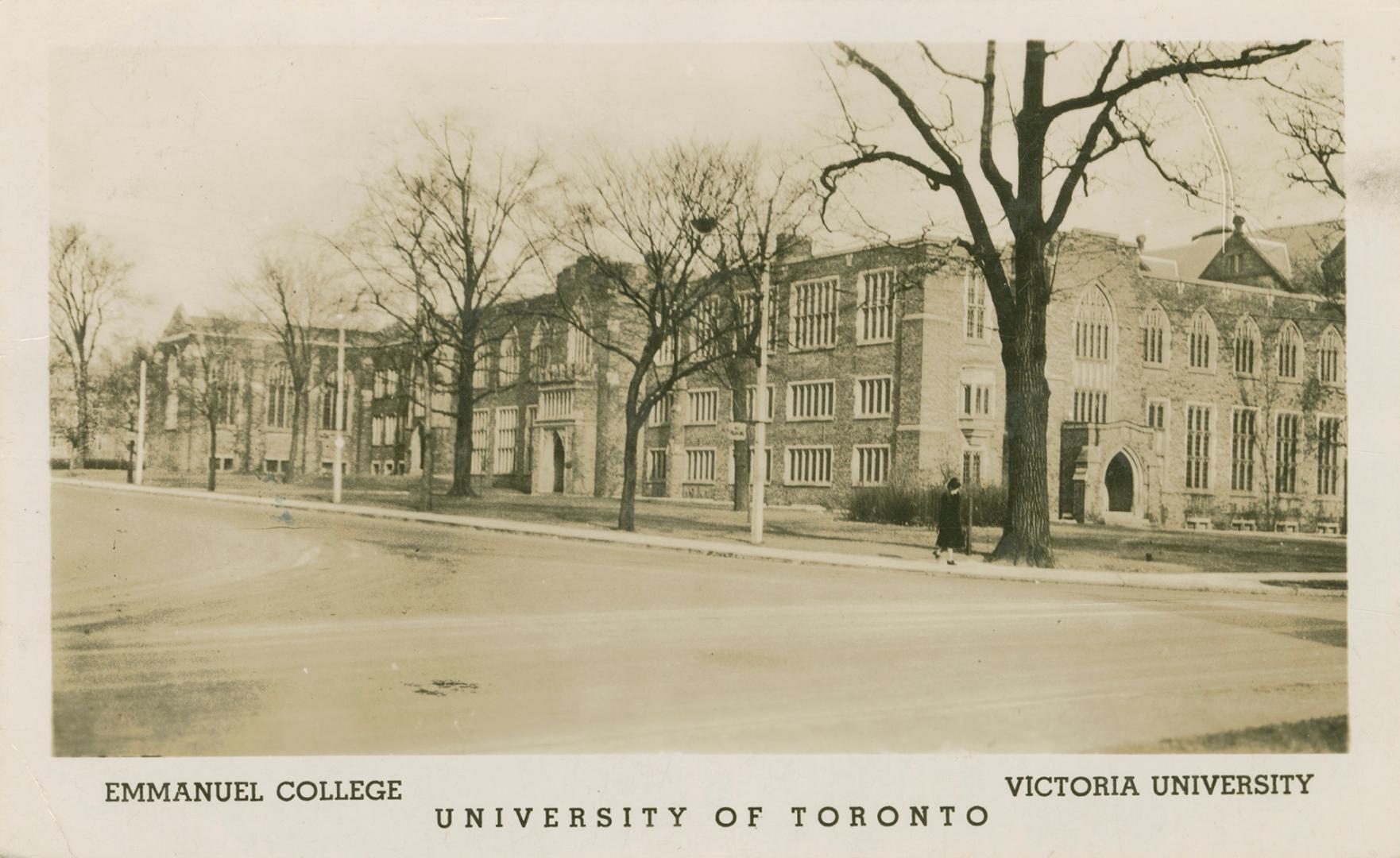 Black and white photograph of a large, three story, stone collegiate building.