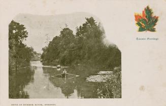 Black and white picture of row boats on a river.