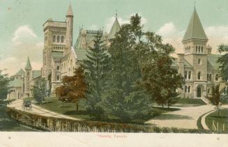 Colorized photograph of a very large stone building with many towers.