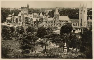 Black and white photo postcard depicting an exterior, elevated view of Hart House at the Univer…