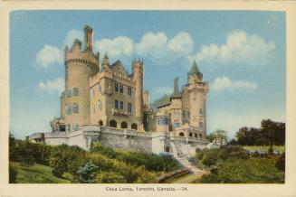 Colorized photograph of a castle with a stone wall in front of it.