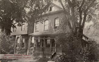 Black and white photograph of a large Victorian house with a front verandah.