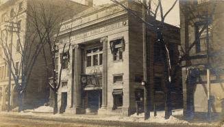 A photograph of a two story building in an Edwardian Beaux Arts Classical Revival style, with t ...