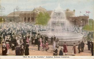 Colorized photograph of a huge crowds of people walking in front of a very large, marble founta…