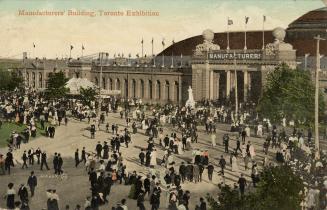 Colorized photograph of crowds of people waling on roads and lawns in front of large,, poured c…