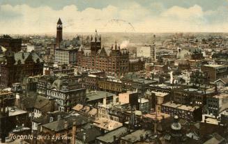 Colorized photograph of an aerial view of a large city downtown area with skyscrapers. 