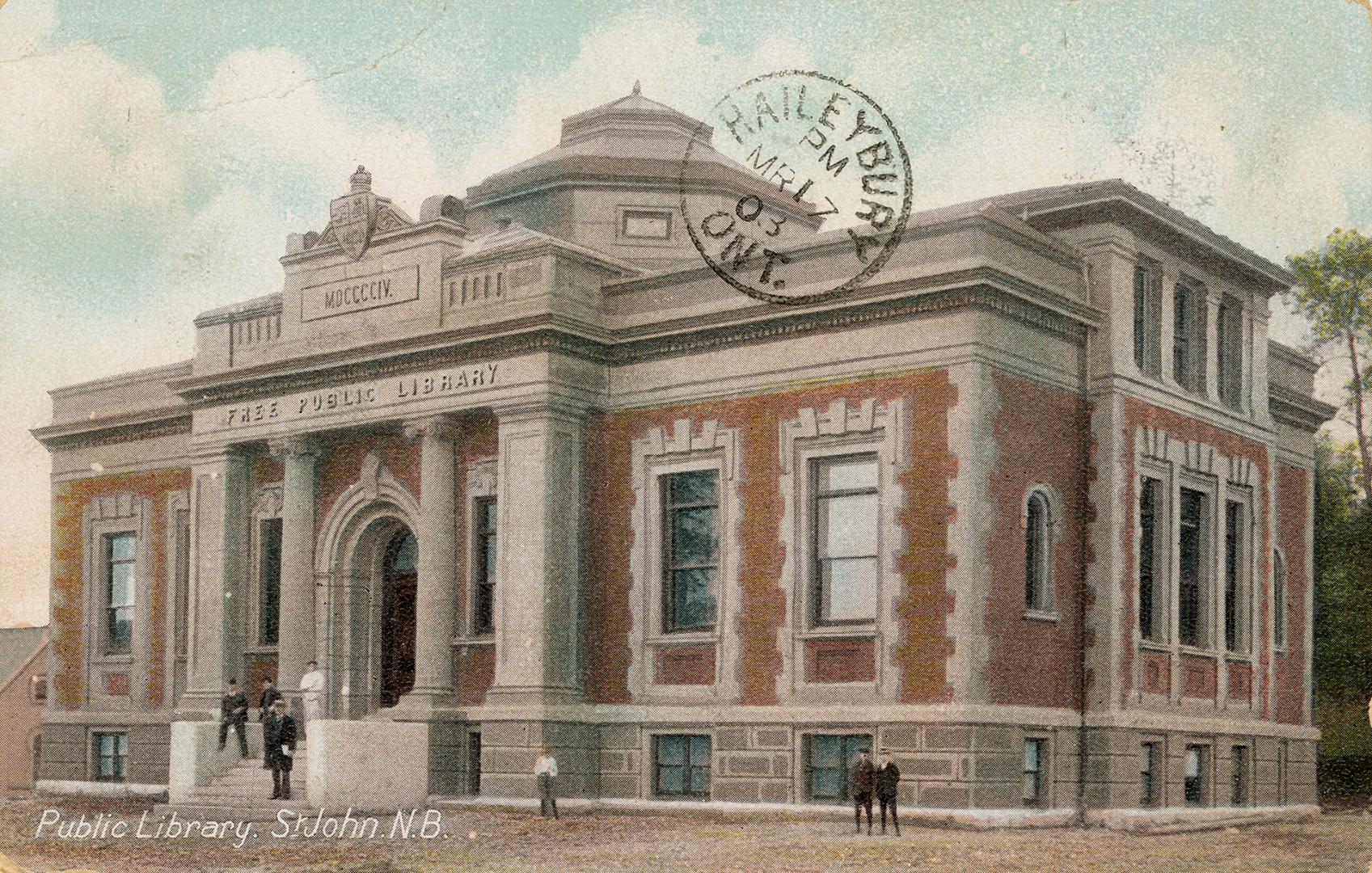 Picture of large brick and stone library building . 