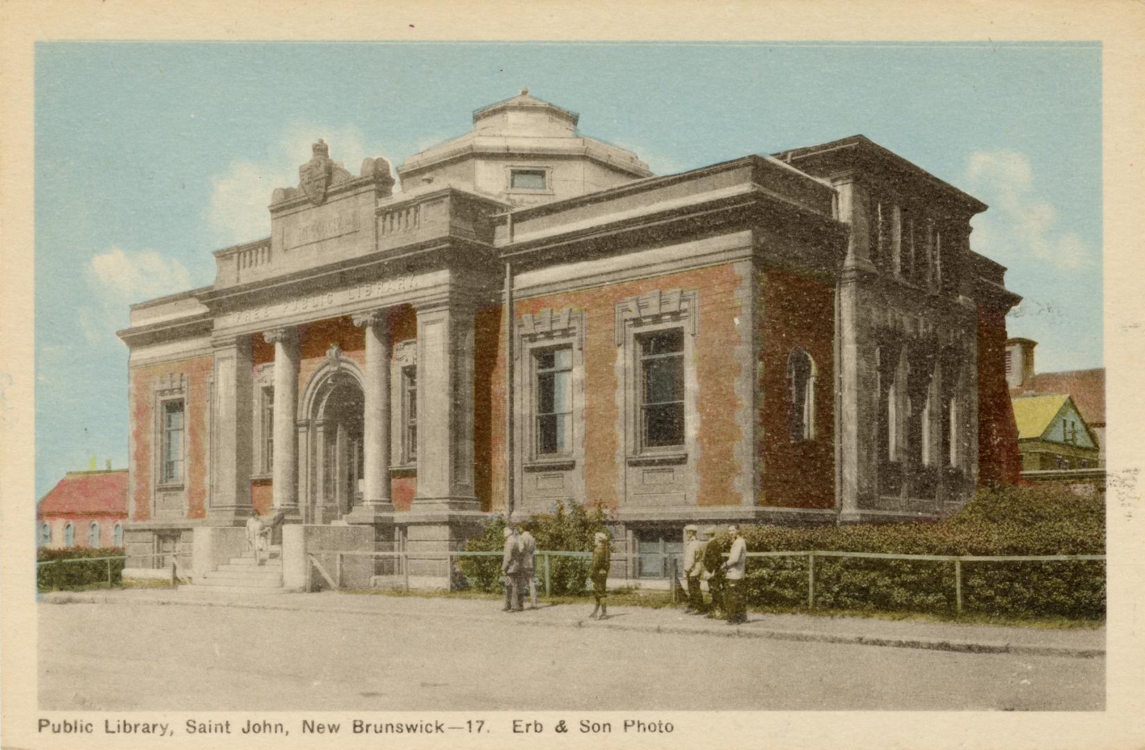 Picture of large brick and stone library building . 