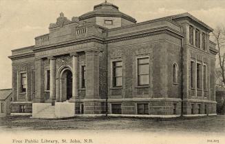 Picture of large brick and stone library building.