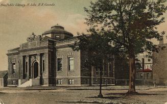 Picture of large brick and stone library building.