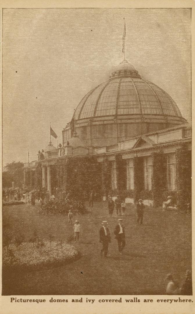 Sepia toned photograph of crowds of people standing in front of a huge Beaux Arts biding with a…