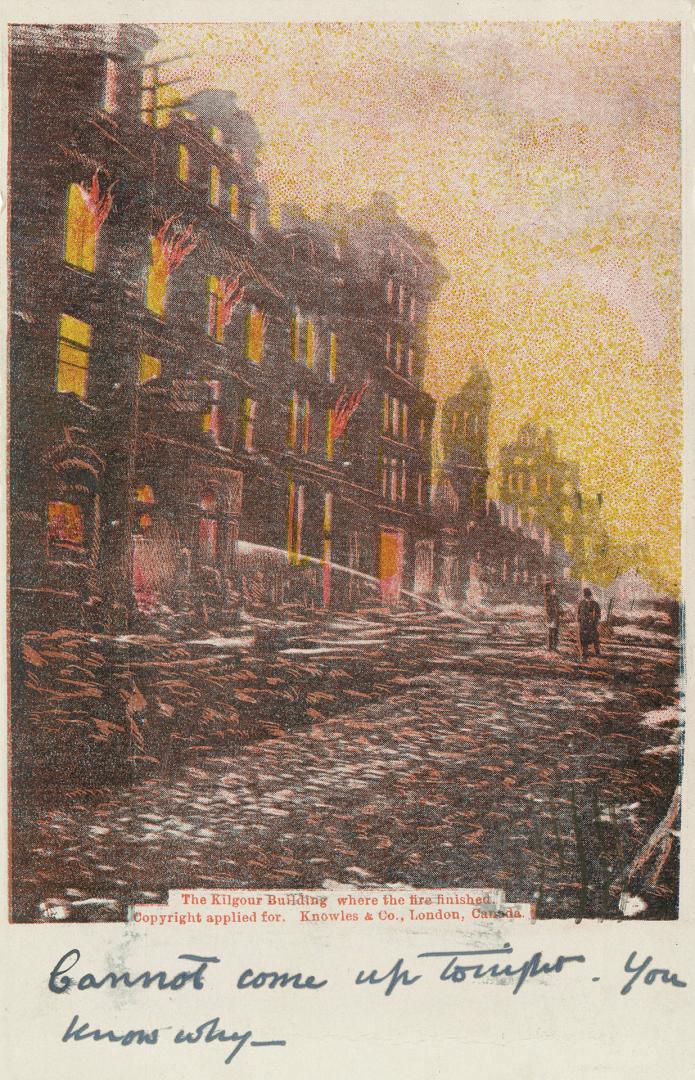 Colour postcard depicting buildings on fire during the 1904 fire of Toronto. The caption on the…