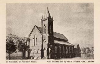 Black and white photograph of a three story church building of gothic revival architecture.