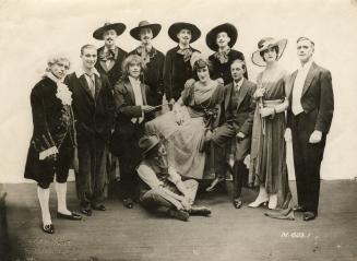 Black and white photograph of the Dumbells at the Coliseum Theatre, London, England.