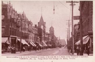 Black and white photograph of a downtown city street.