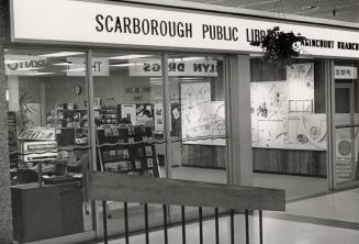 Picture of front of library branch inside a mall. 