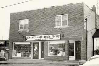 Picture of exterior of storefront library branch. 