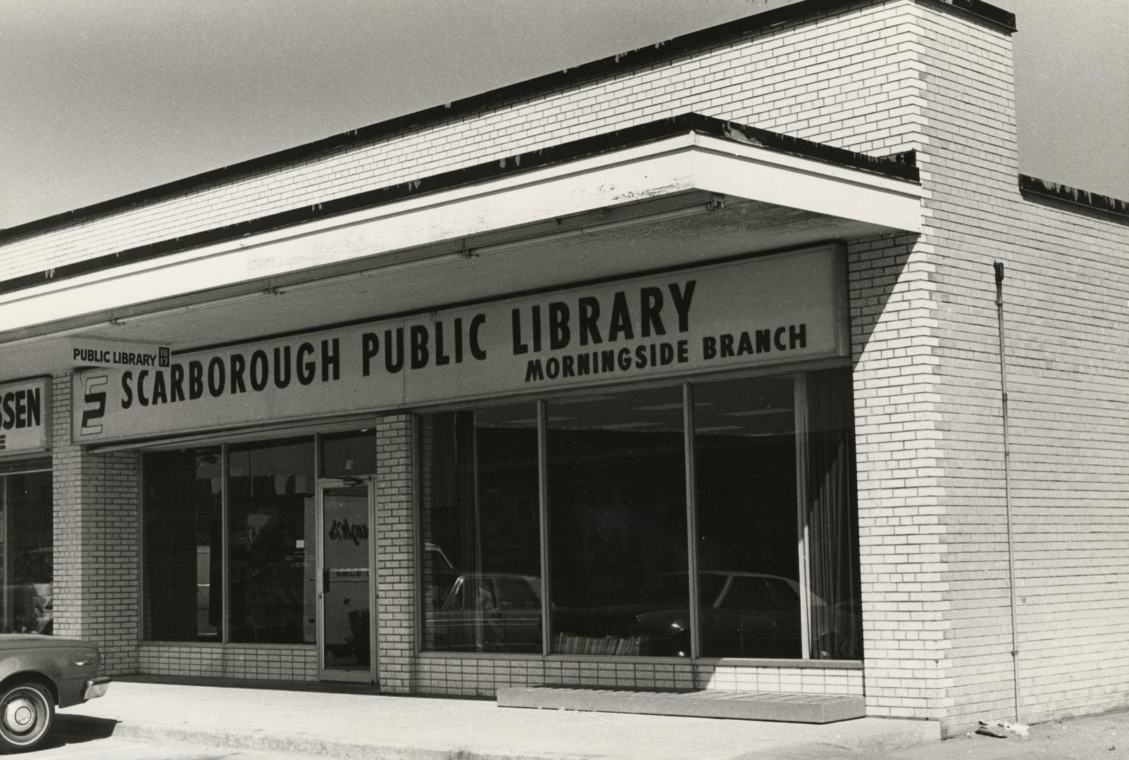 Picture of exterior of storefront library branch. 