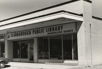 Picture of exterior of storefront library branch. 